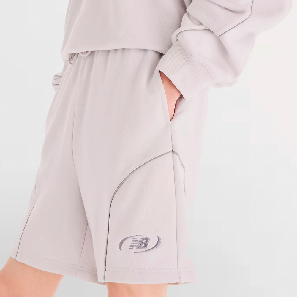 NEW BALANCE PANT. CORTO FRENCH TERRY SHORT 7